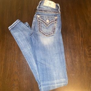 Size 24 Miss Me Low-Rise Skinny Jeans.